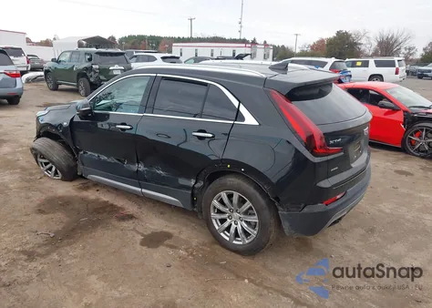 2023 Cadillac Xt4 Awd Premium Luxury from USA, damaged, VIN 1GYFZDR42PF140792